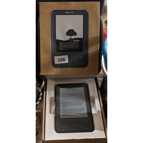 106 - Boxed Amazon Kindle with charger and guide, model D00901