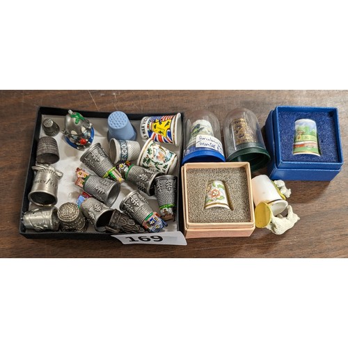 169 - Small bundle of assorted souvenir thimbles