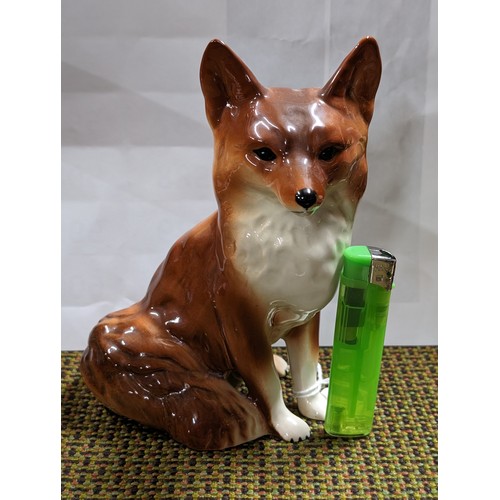 194 - 16 cm tall Coopercraft sitting fox figure