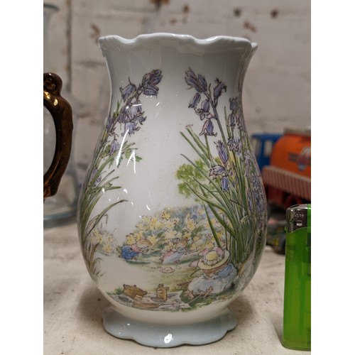 215 - 1989 Royal Doulton 'The picnic' vase by Jill Barklam