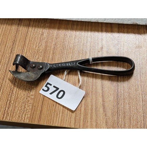 570 - Vintage steel never slip can opener