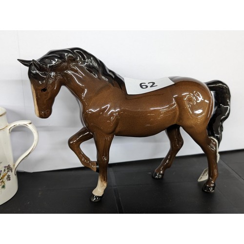 62 - 21 cm long and 15 cm tall Beswick chestnut with white blaze and sock, right front leg raised figure