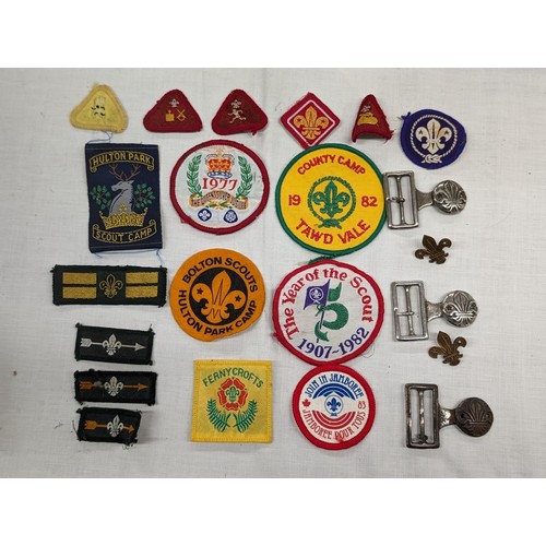 317 - Collection of cub and scout badges and buckles