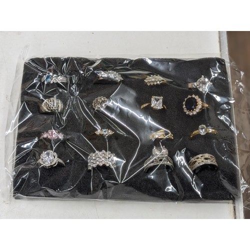 315 - Bundle of 16 x assorted costume and dress rings on display pad