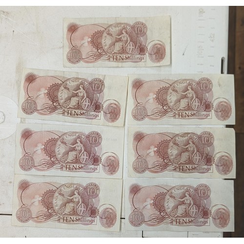 245 - 7 x Hollom UK 10 shilling notes