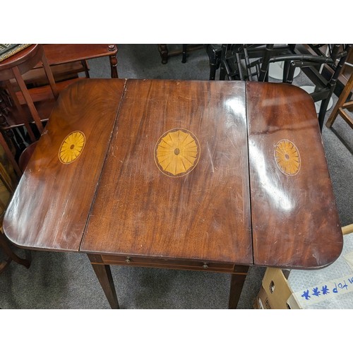 205 - 3 ft wide mahogany drop leaf dining table with inlaid patterning on top and each leaf, deep storage ... 