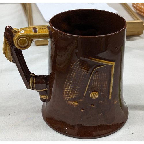 53 - Rare large vintage Dartmouth pottery treacle glazed mug/tankard with football detailing