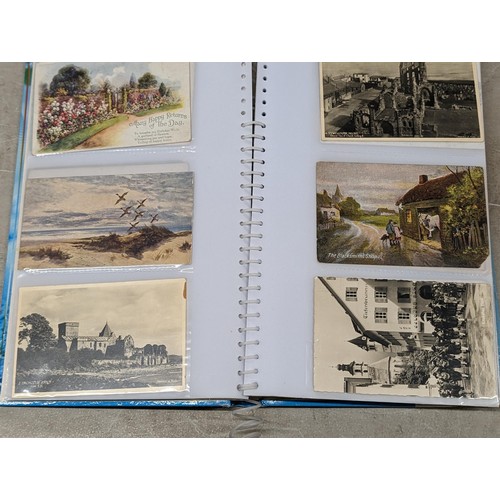 56 - Vintage postcard album full of assorted postcards