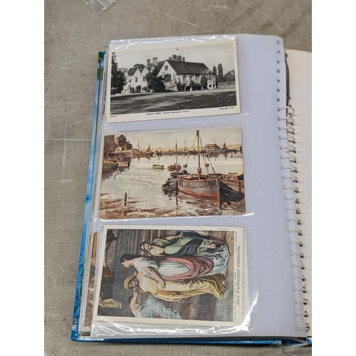 56 - Vintage postcard album full of assorted postcards