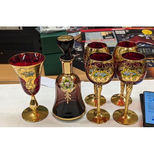 157 - Vintage hand painted ruby glass decanter and set of 4 x wine glasses plus other similar goblet