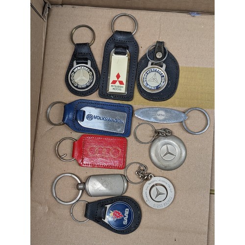 112 - 10 x assorted car manufacturer keyrings including Mercedes, VW, Mini etc