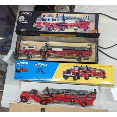 151 - 2 x boxed Corgi US fire trucks