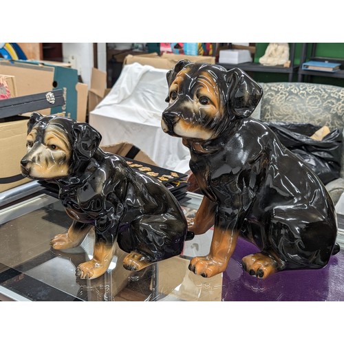 126 - 38 and 28 cm tall ceramic Rottweiler sitting figures