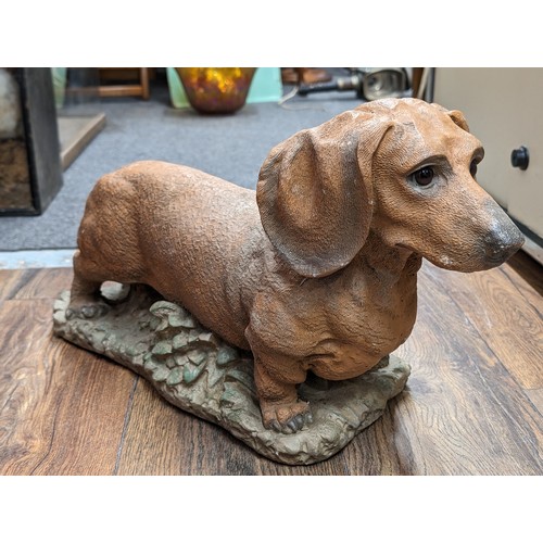 355 - 55 cm long coloured stoneware dachshund garden ornament - signed and dated 1996