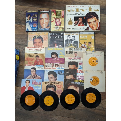 93 - Collection of Elvis Presley vinyl singles, audio cassette box set, DVDs(1 still sealed) and VHS vide... 