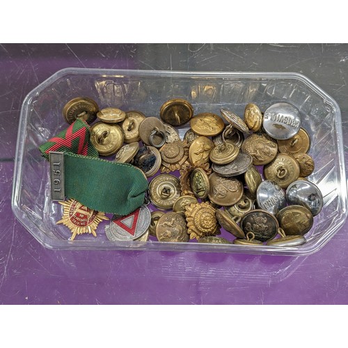 88 - Tub of assorted mostly military uniform buttons etc