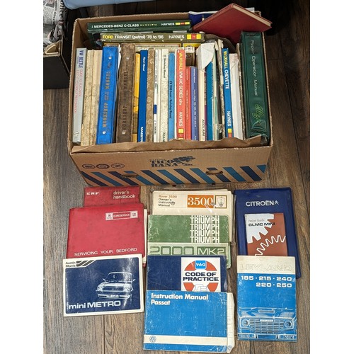 145A - Box of automobilia being assorted Haynes and workshop manuals and drivers hand books etc