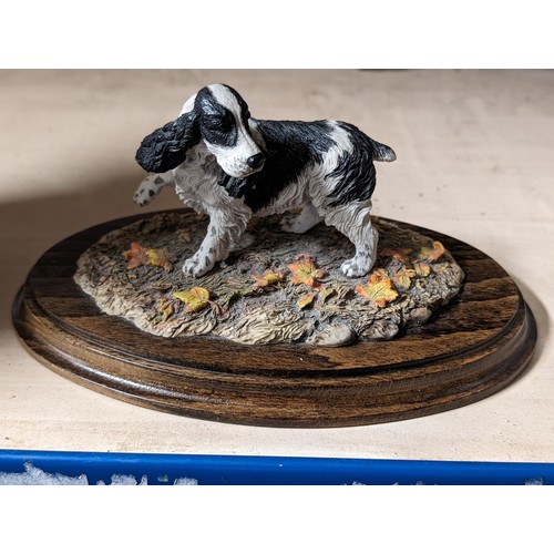 7 - Country Artists spaniel figure by K. Sherwin on 20 x 13 cm oval wooden base