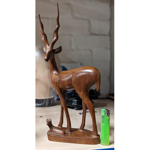 10 - Approximately 34 cm tall retro wooden antelope with young figure (end of one antler missing) and oth... 