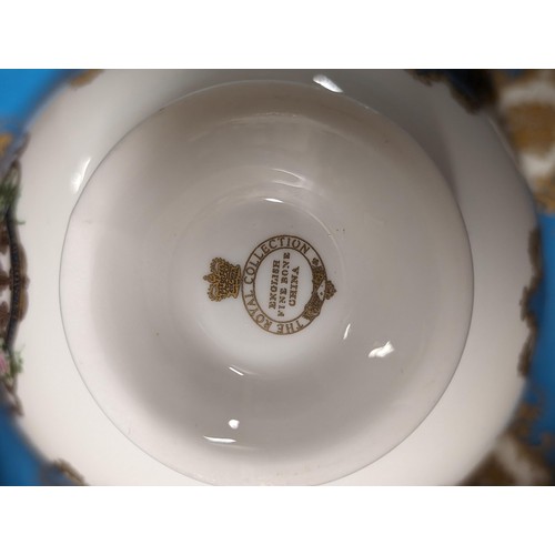 92 - Boxed and mint English fine bone china, the royal collection cup and saucer