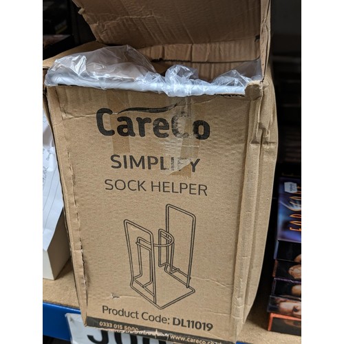 126 - Boxed and looks unused Careco simplify sock helper