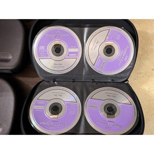 209 - 9 x Pro-X CD/DVD cases full and part full with assorted Daily Mail and Express CDs and DVDs