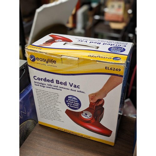 231 - Boxed as new Easylife corded bed vac