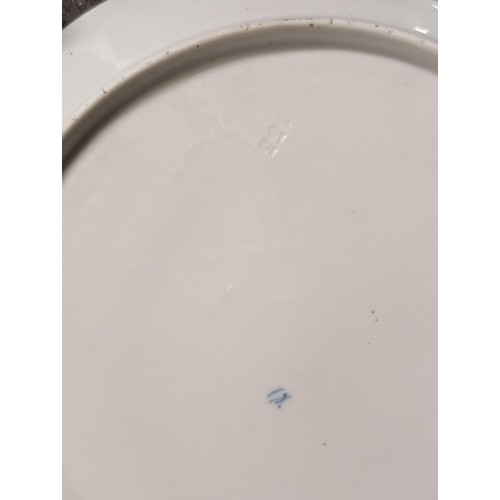 246 - Approximately 21.5 cm diameter Delft? blue and white windmill scene wall plate