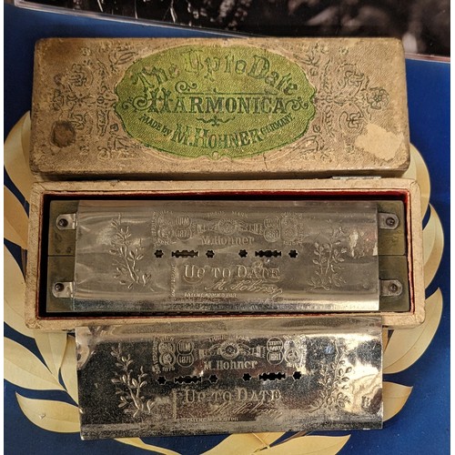 282 - Hohner 'The up to date' twin harmonica in original distressed box - back plate loose