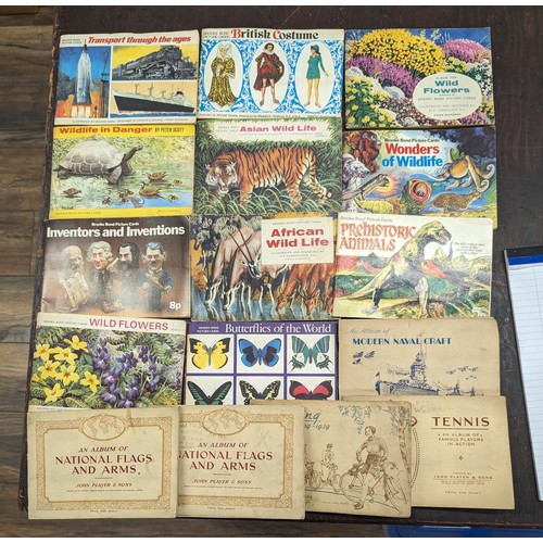 94 - Collection of 11 x Brooke Bond and 5 x Players cigarette/tea card albums - all complete except one N... 