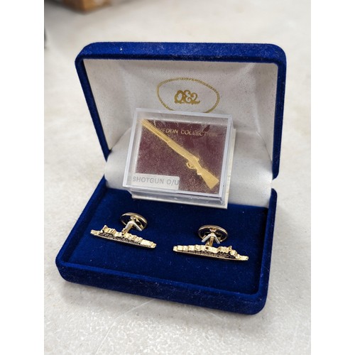 3 - As new gold tone QEII cruise ship cufflinks and vintage Clevedon gold tone shot gun tie pin