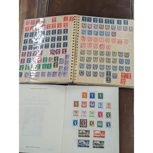 263 - QEII stamp album - complete and large photo album containing assorted UK stamps