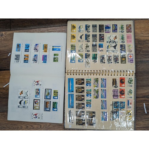 263 - QEII stamp album - complete and large photo album containing assorted UK stamps