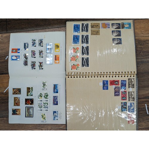 263 - QEII stamp album - complete and large photo album containing assorted UK stamps