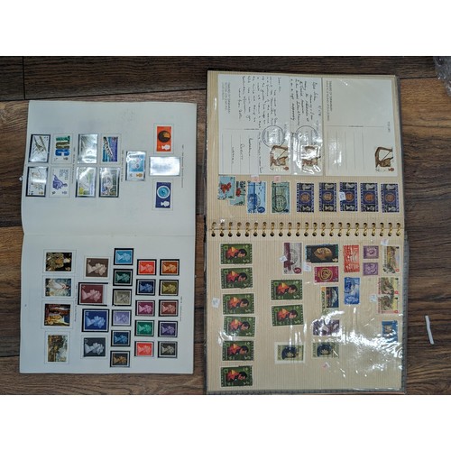 263 - QEII stamp album - complete and large photo album containing assorted UK stamps