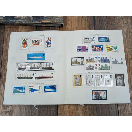 263 - QEII stamp album - complete and large photo album containing assorted UK stamps