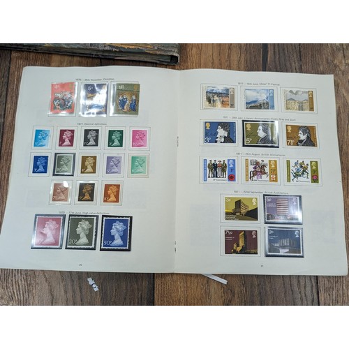 263 - QEII stamp album - complete and large photo album containing assorted UK stamps