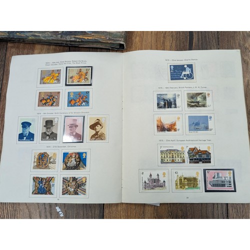 263 - QEII stamp album - complete and large photo album containing assorted UK stamps