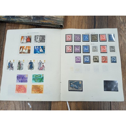 263 - QEII stamp album - complete and large photo album containing assorted UK stamps