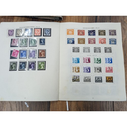 263 - QEII stamp album - complete and large photo album containing assorted UK stamps