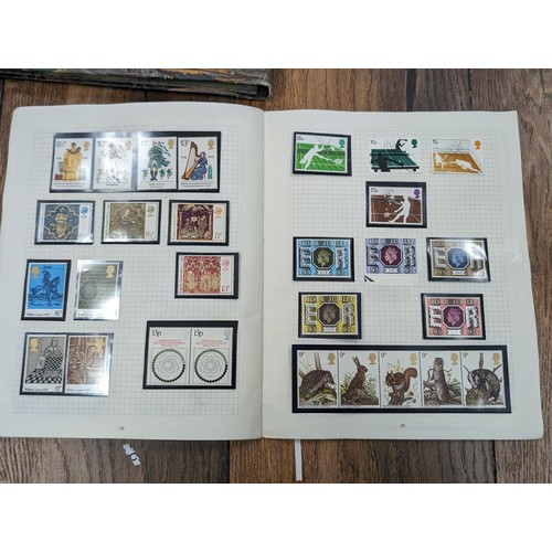 263 - QEII stamp album - complete and large photo album containing assorted UK stamps