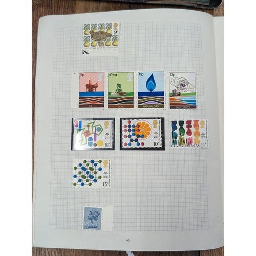 263 - QEII stamp album - complete and large photo album containing assorted UK stamps