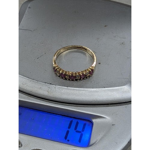 486 - 375 hallmarked 9 carat gold garnet and diamond dress ring size J - 1.4 gm - all proceeds from this l... 