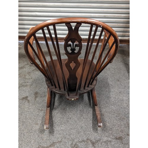 226 - Vintage Ercol dark elm windsor rocking chair