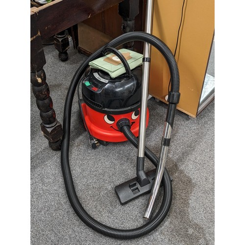 336 - Henry cylinder vac, model NRV 200-C2, with hose and pipe plus spare bag