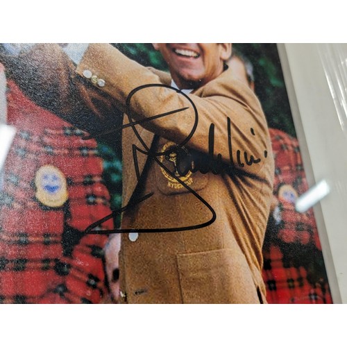 54 - 37 x 42 cm framed and mounted and autographed Tony Jacklin lifting the Ryder Cup enlarged photograph... 