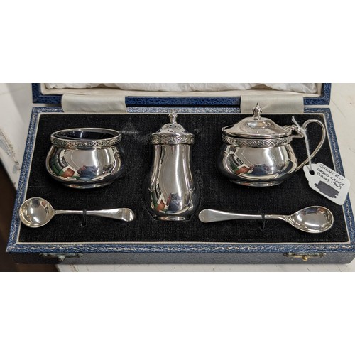 185 - Near mint and cased 1969 Joseph Gloster hallmarked silver cruet set with blue glass liners and 1900 ... 