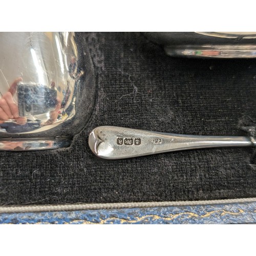 185 - Near mint and cased 1969 Joseph Gloster hallmarked silver cruet set with blue glass liners and 1900 ... 