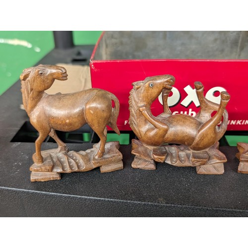 13 - 6 x hand carved small wooden horses with glass eyes in old OXO tin