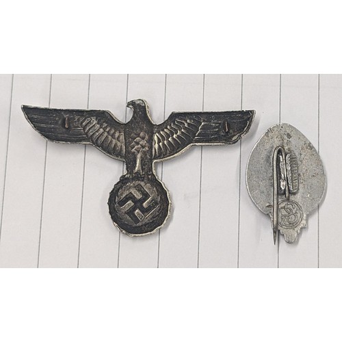 194 - WWII German eagle cap badge and 1935 Hitler Youth badge